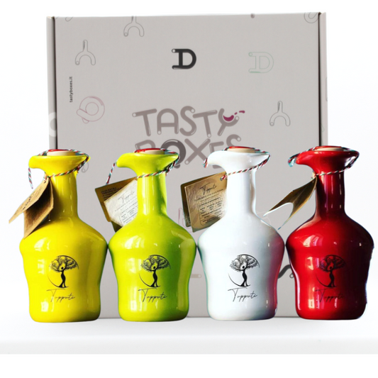Box Olio extravergine di oliva coratina iin 4 originali bottiglie di ceramica in  4 colori diversi: giallo, verde, bianco e rosso
